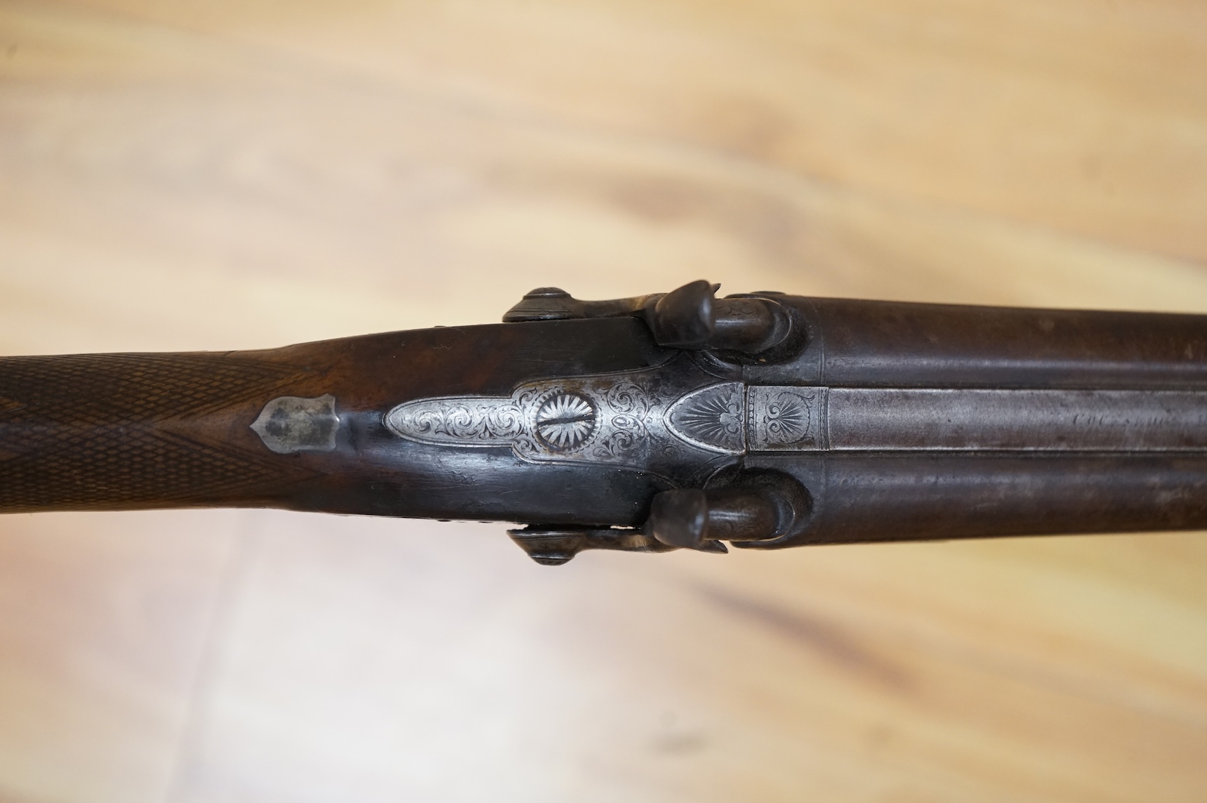 A 1907 bayonet in its scabbard with the tip of the blade shortened, together with a Glengarry cap of the KOSB, post 1902 badge and a brown leather shoulder belt and pouch with QE2 bronze badge of the Royal Artillery